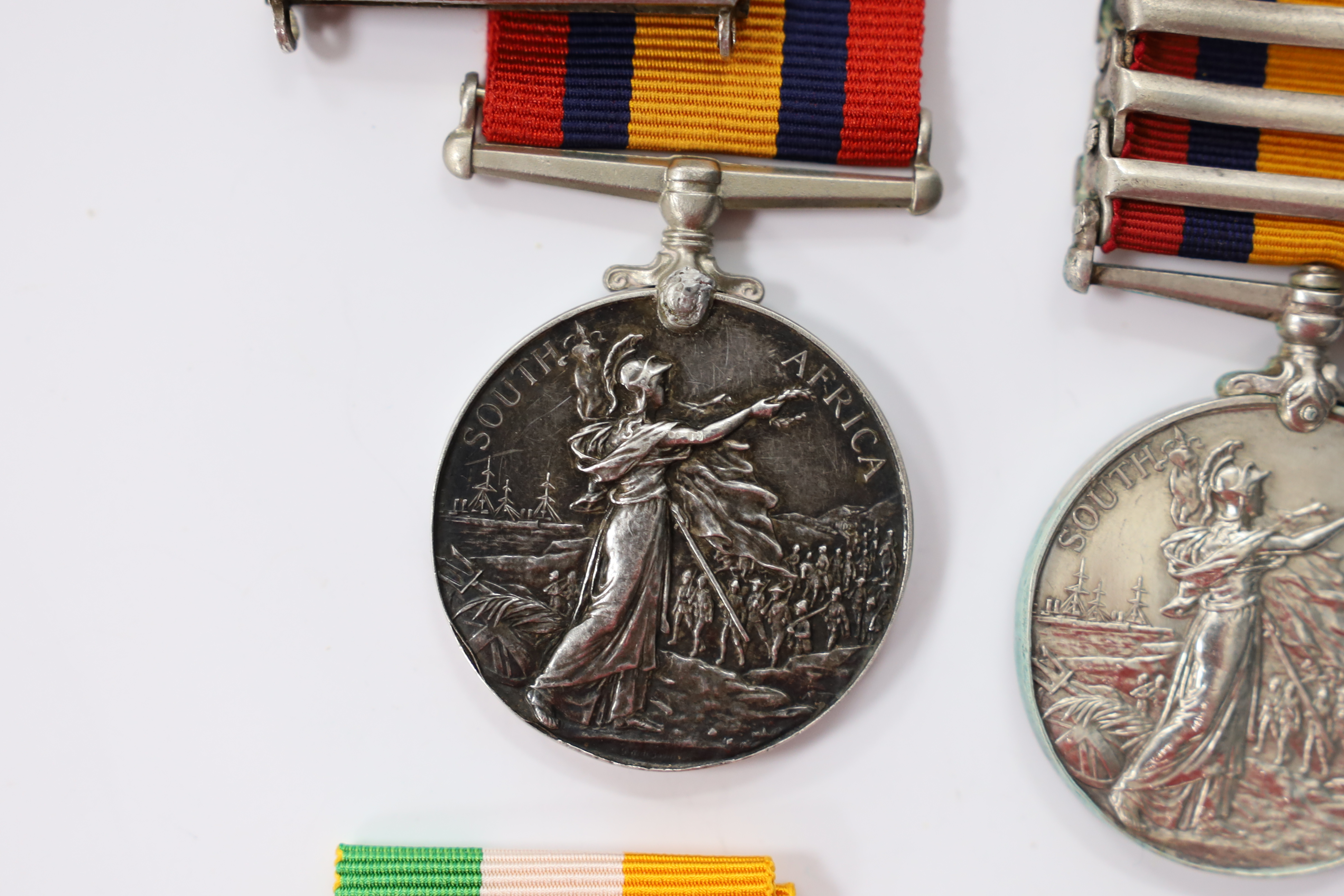 Assorted medals; two replica British North Borneo medals; Balaklava medallion; bronze GV medal; German China Campaign medal; bronze NRA medallion, unnamed